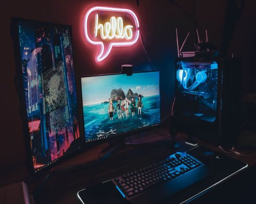 Modern gaming PC setup with neon lighting
